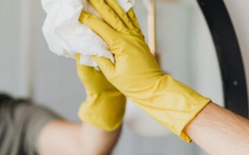 disinfecting a wall mirror