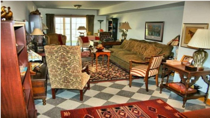 large living room filled with antique furniture