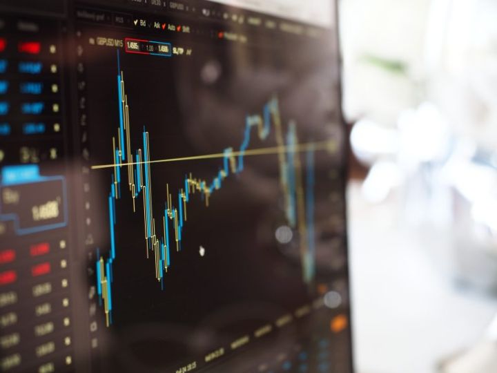 monitor displaying a stock chart