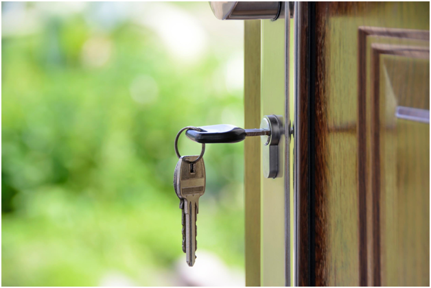 open front door with key in lock