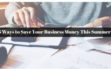 business person at a desk with calculator and papers