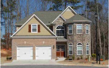 front of a home with woods in back