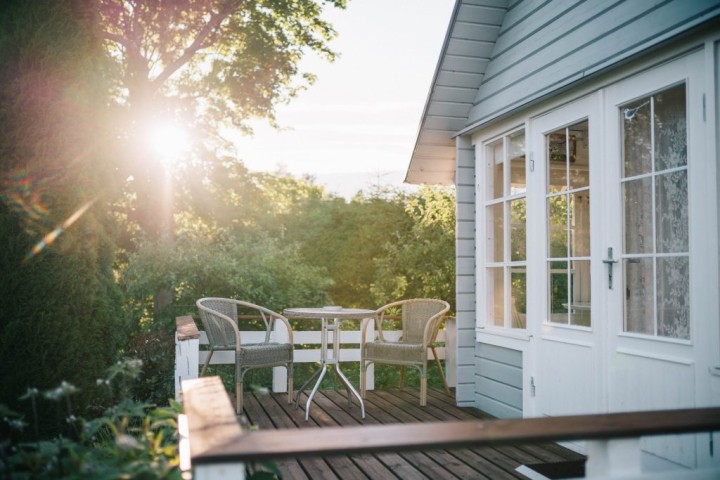 deck in the back of a house in sunlight