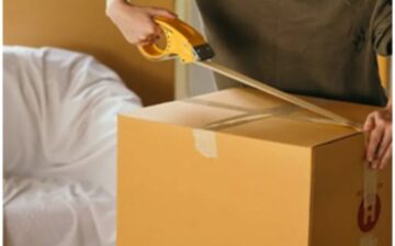 woman packing a box