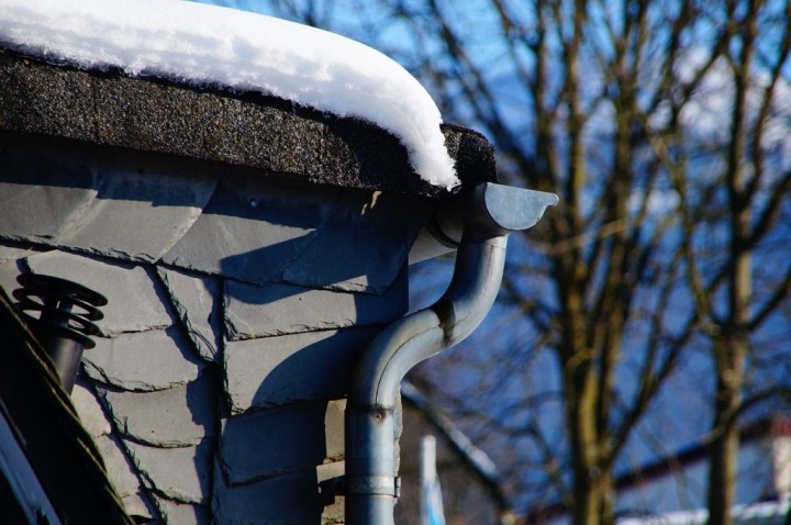 snow-covered roof and gutter