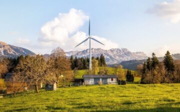 country home with energy windmill in back