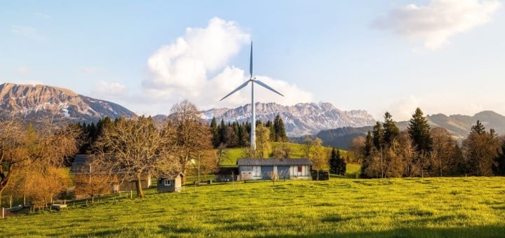 country home with energy windmill in back