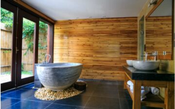 bathroom with modern fixtures and large window