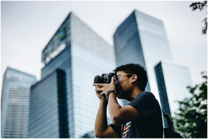 photographer on city street