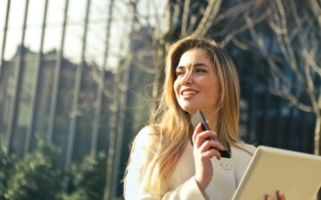 real estate agent with smartphone and tablet