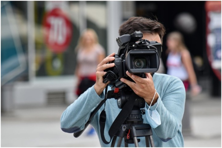 photographer on city street