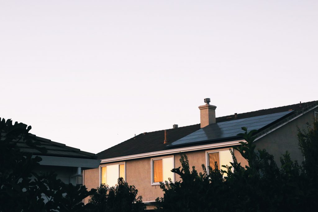 house with roof solar panels