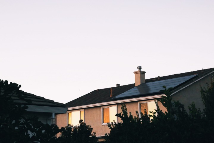 house with solar panel on roof