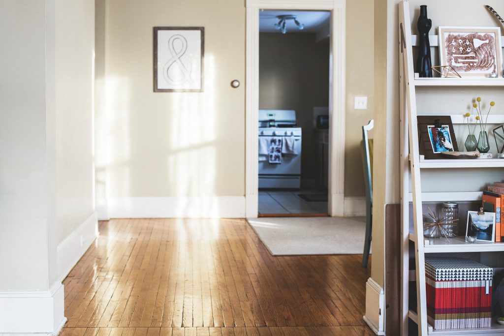 dining room with wood floor and white baseboards