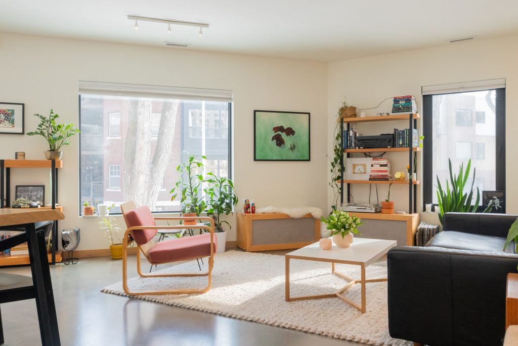 room with windows and basic furniture