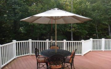 patio with table and umbrella outside
