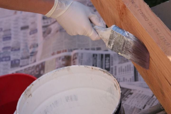 painting a wooden beam