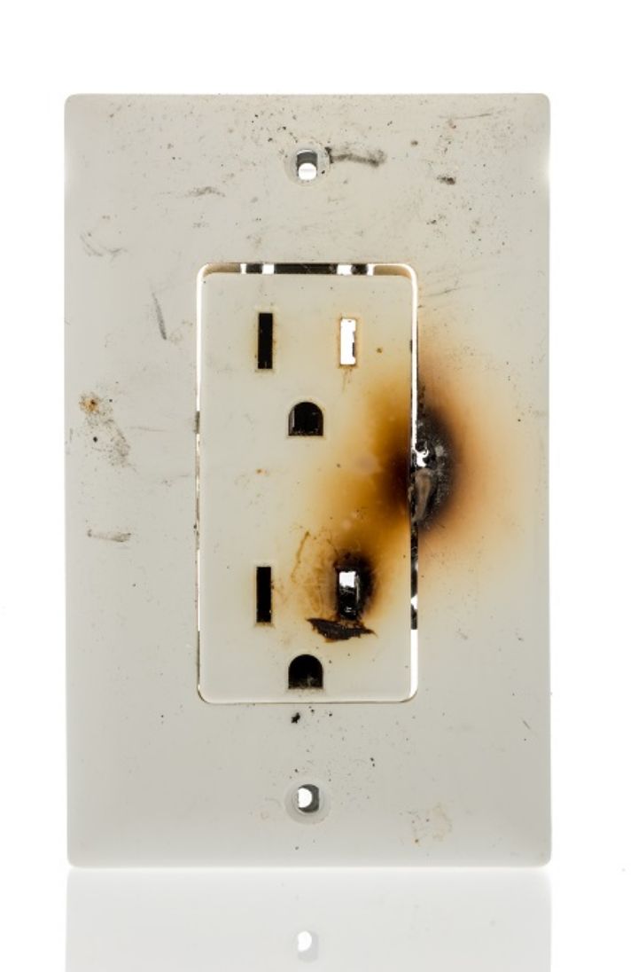 electrical outlet with scorch marks