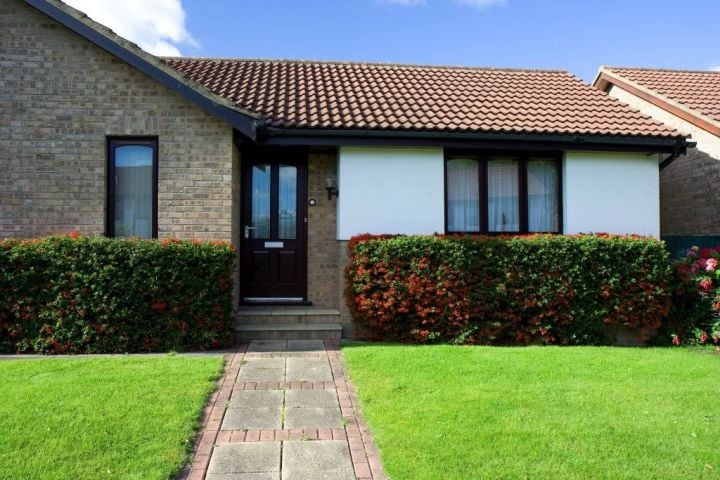 home with manicured lawn