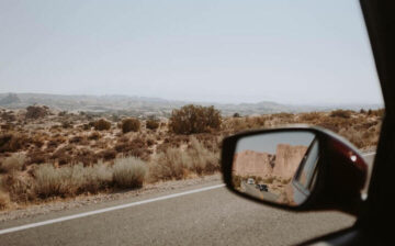 looking out a car window on a road