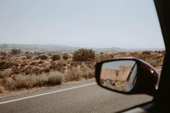 looking out a car window on a road