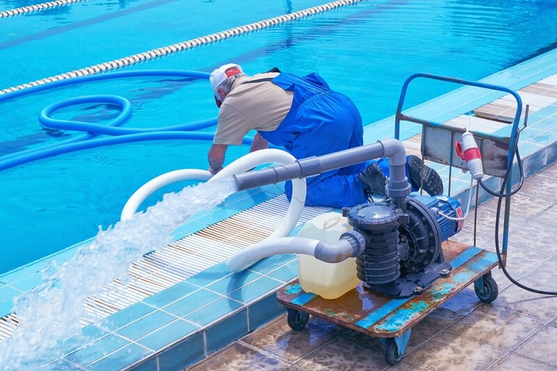 pool service tech at work