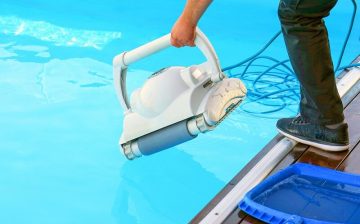 Using pool cleaning tools to maintain a swimming pool