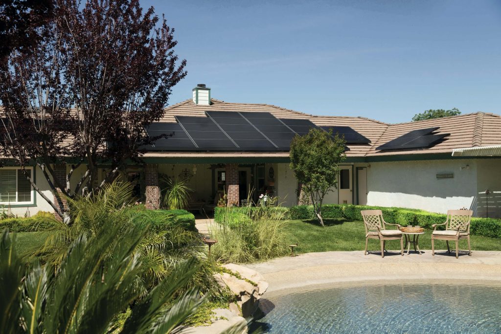 house with solar panels on roof