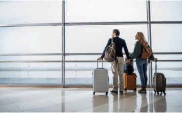 couple at airport with luggage