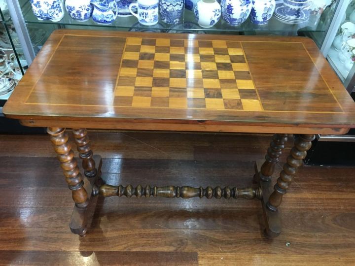 antique table with checkerboard pattern