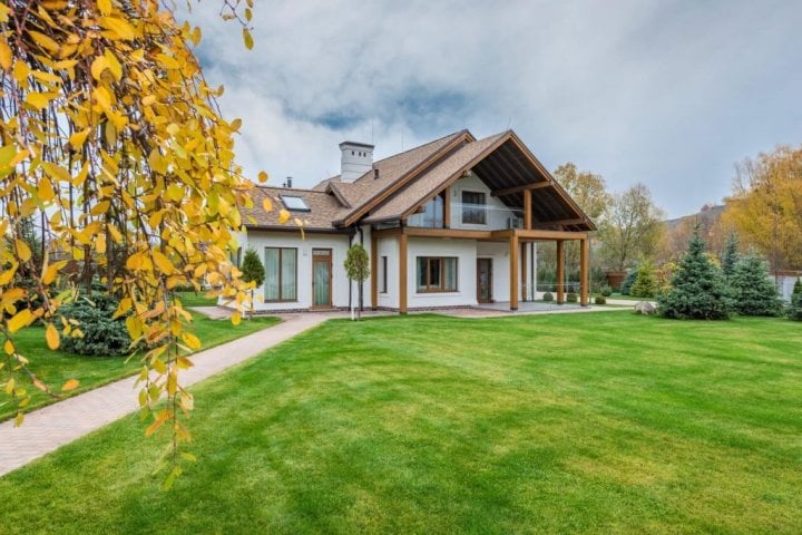 house in countryside with solar panel