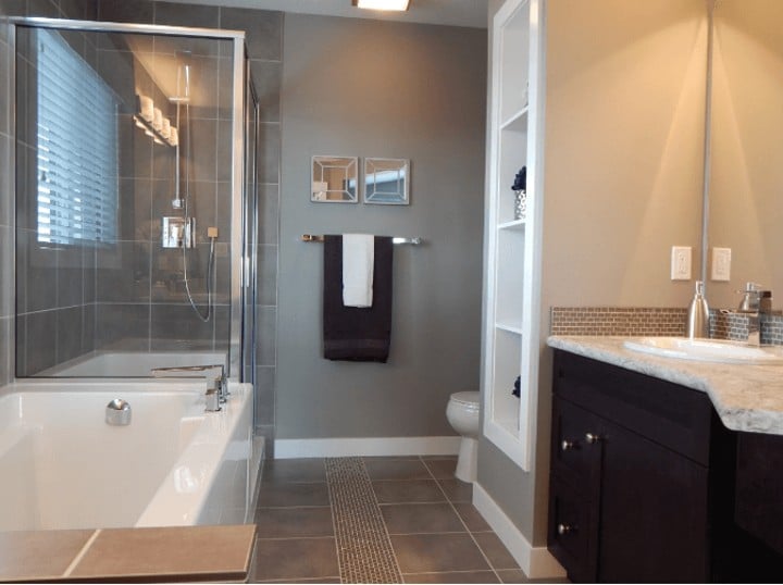 bathroom with glass walls around shower