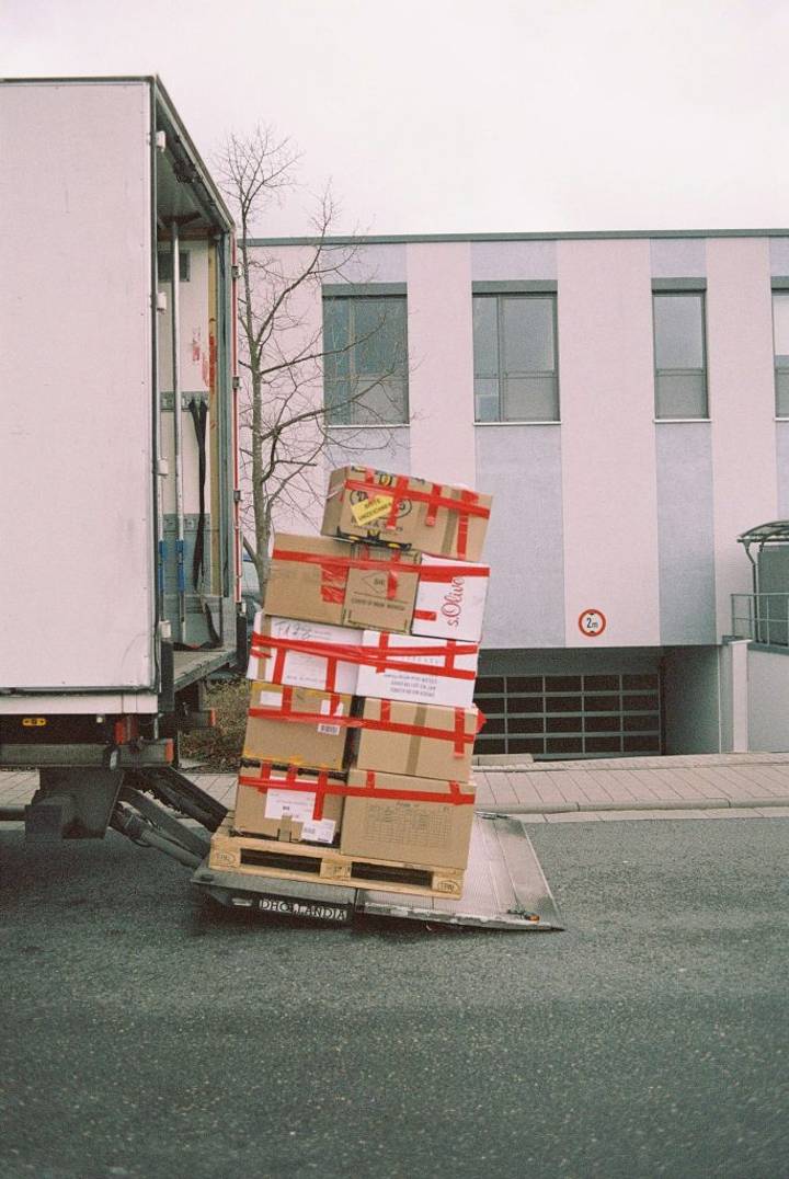 boxes being loaded onto a moving van