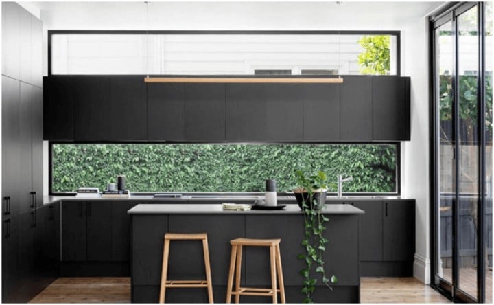 kitchen with dark gray counters and cabinets