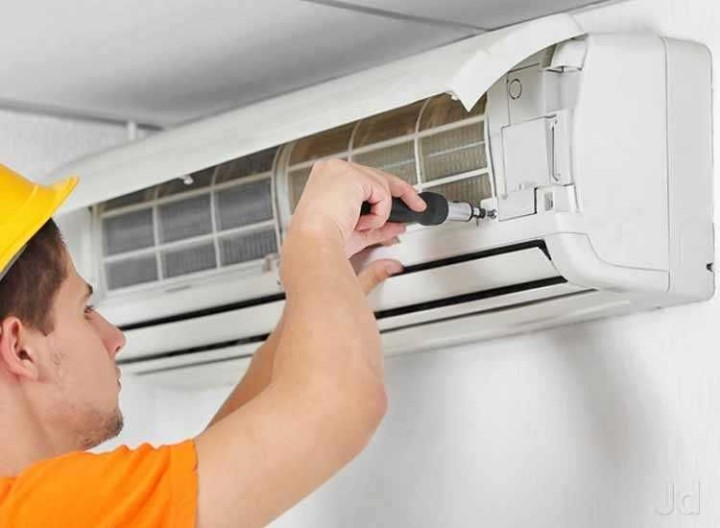 air conditioning technician at work