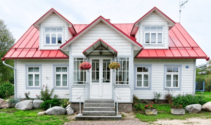 cottage style house with red roof