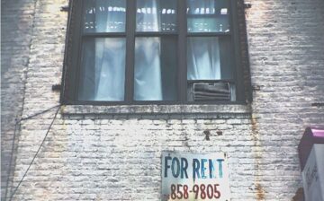 building with for rent sign