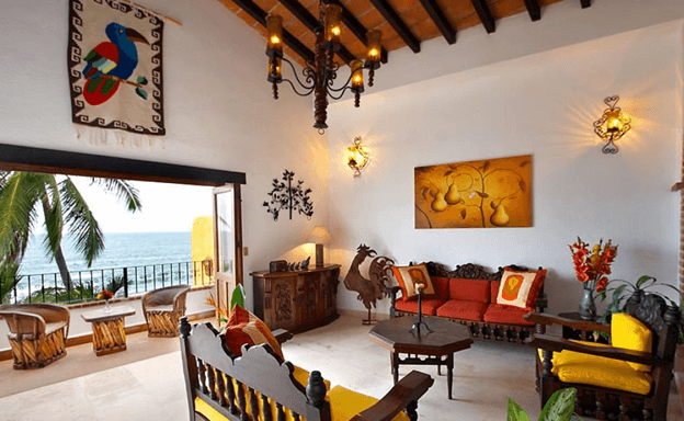 waterfront house with Mexican decor and wall art