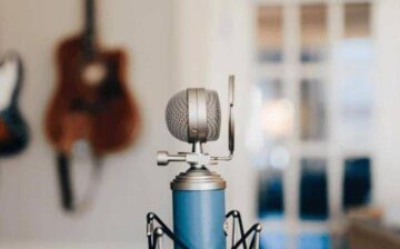microphone in music room with guitar