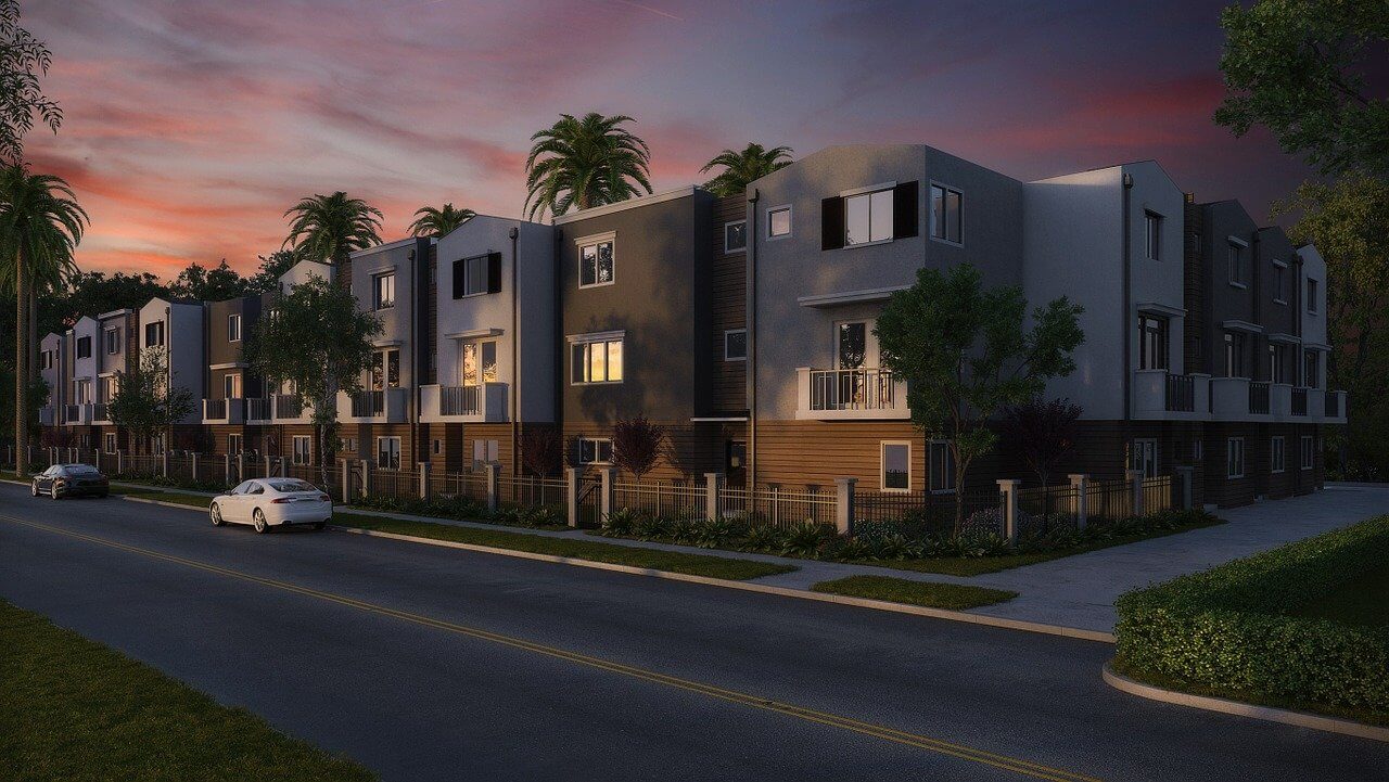 row of condos at dusk