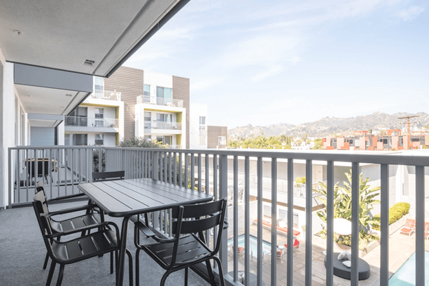 apartment balcony with outdoor furniture