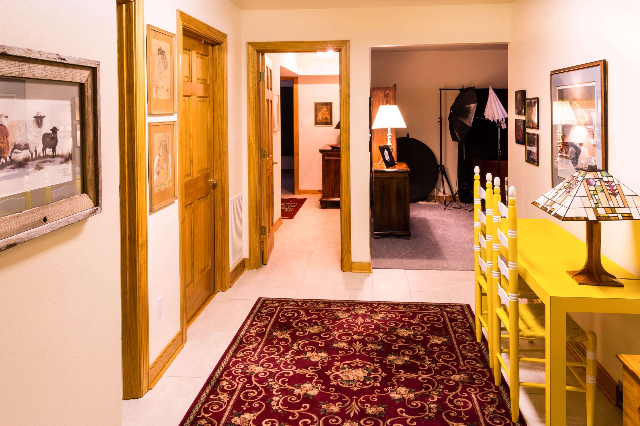 interior hallway with runner rug leading to other rooms