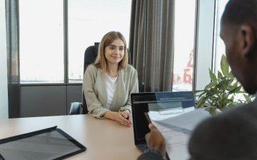 Young woman searching for a job after moving to a new city