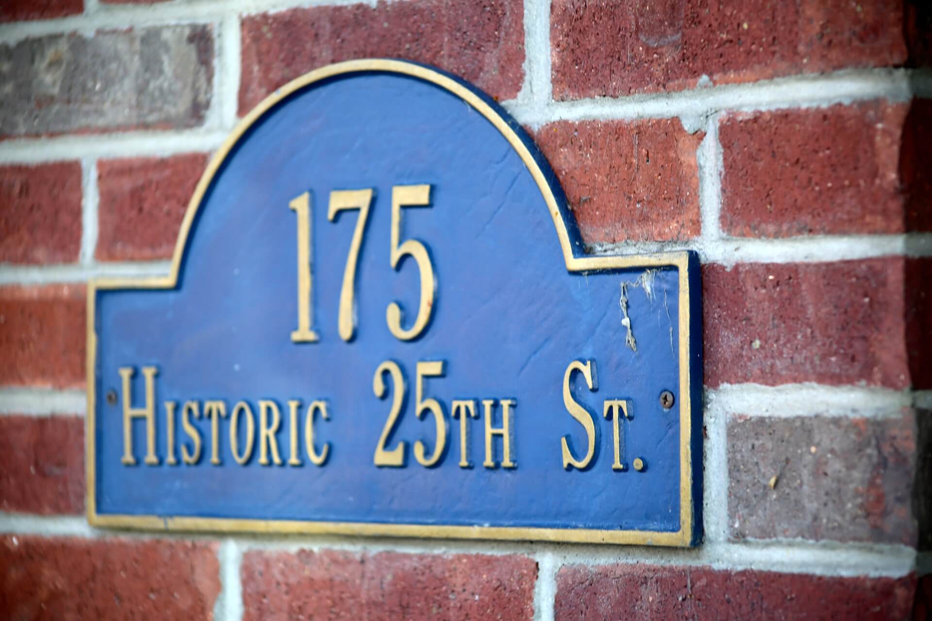 street address on a house wall