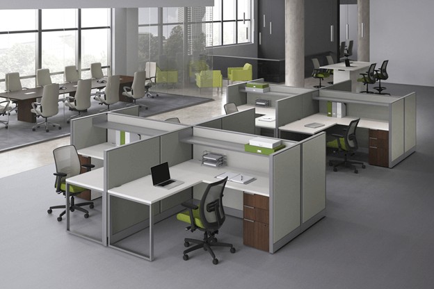 open office space with cubicles and tables