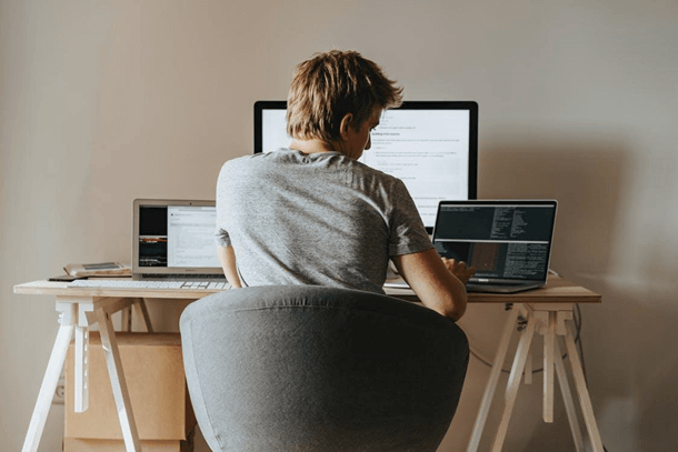 young man working on laptops