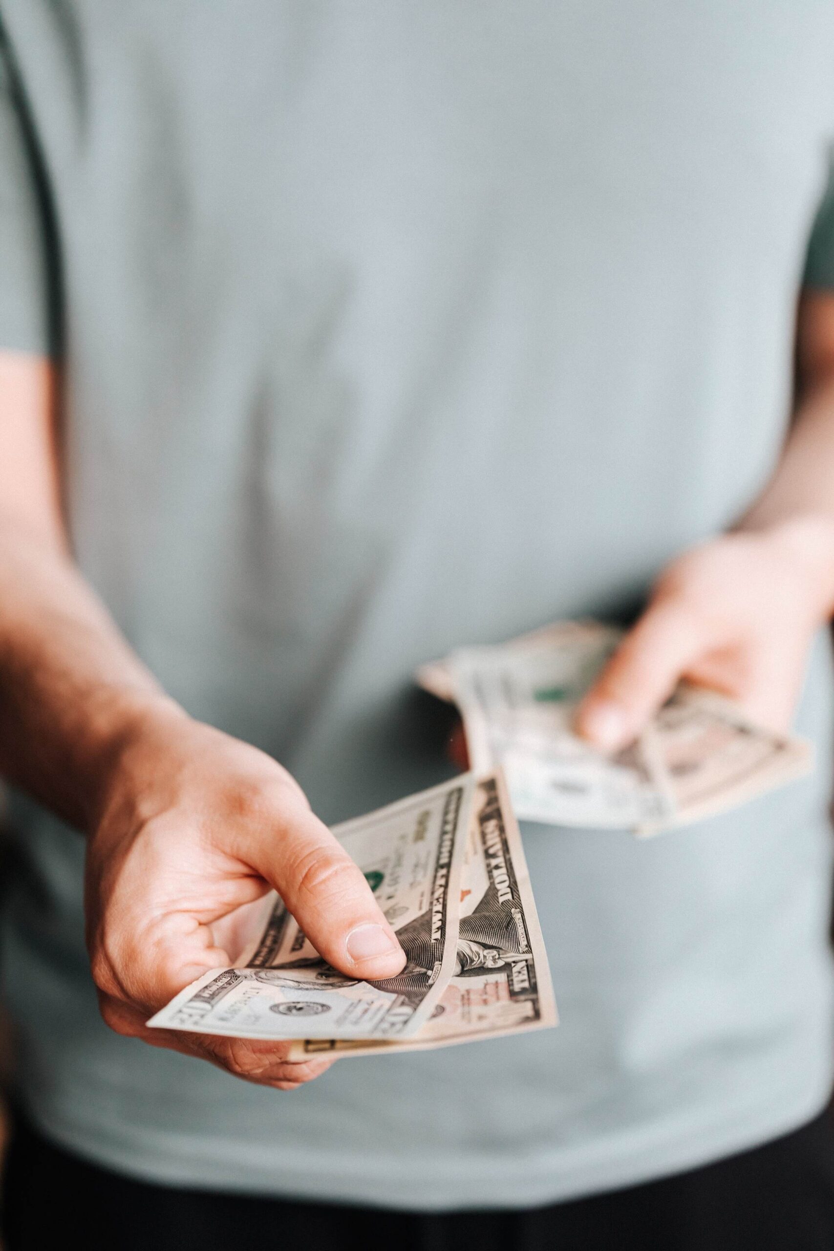 man counting out bills