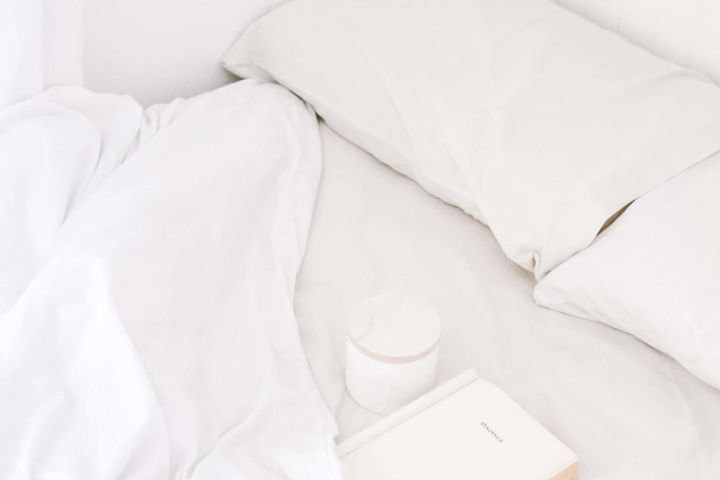 bed with white sheets