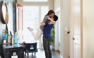 couple hugging after moving