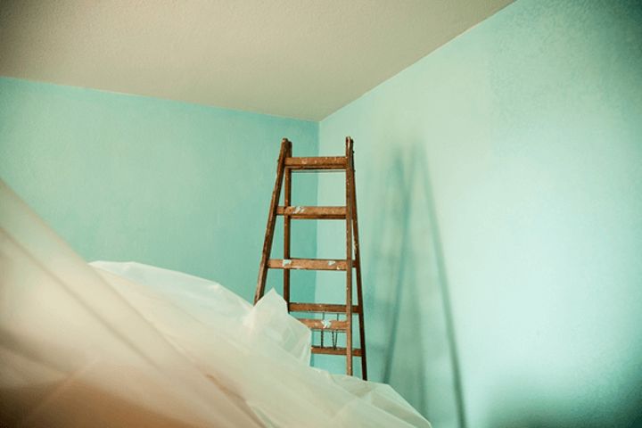 painted room with work ladder